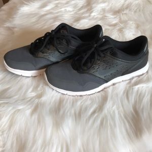 Black and grey Nike’s with leather detail